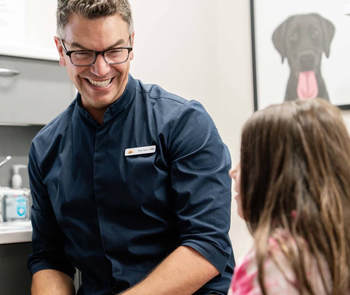 dr. Sears smiling with patient