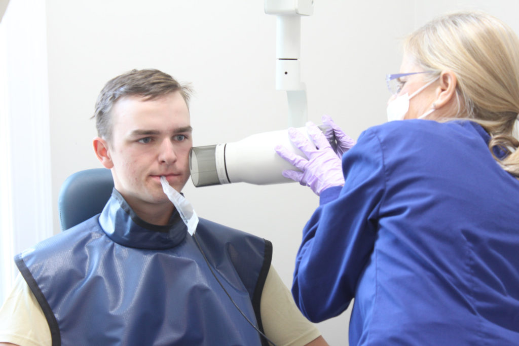 Teenage patient receiving an X-Ray