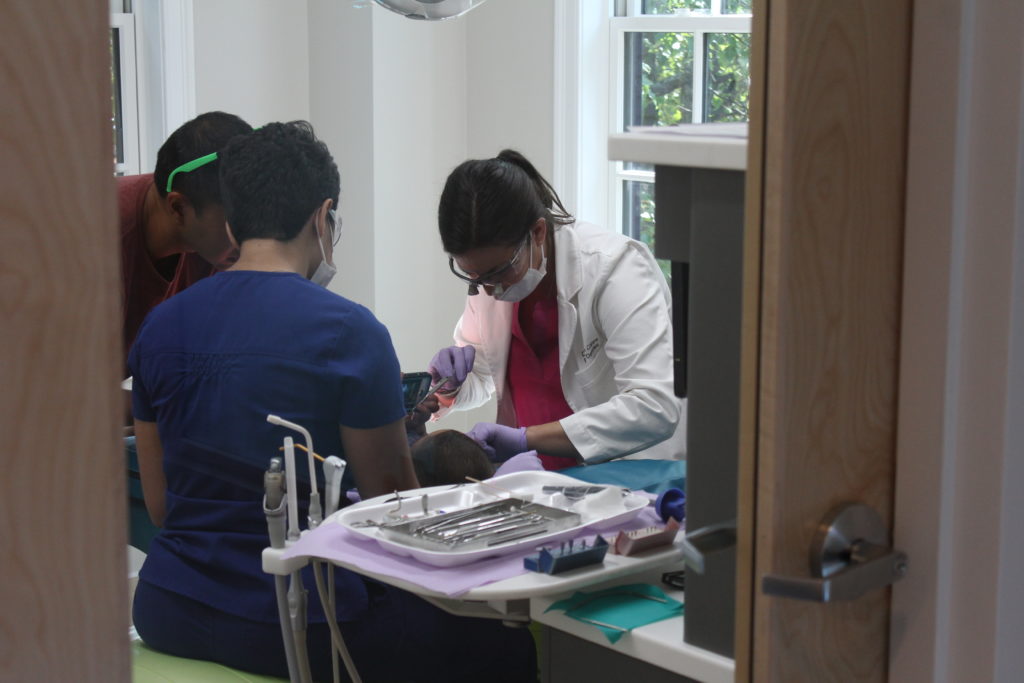 doctor working with a patient